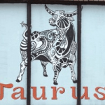 Taurus storefront painting