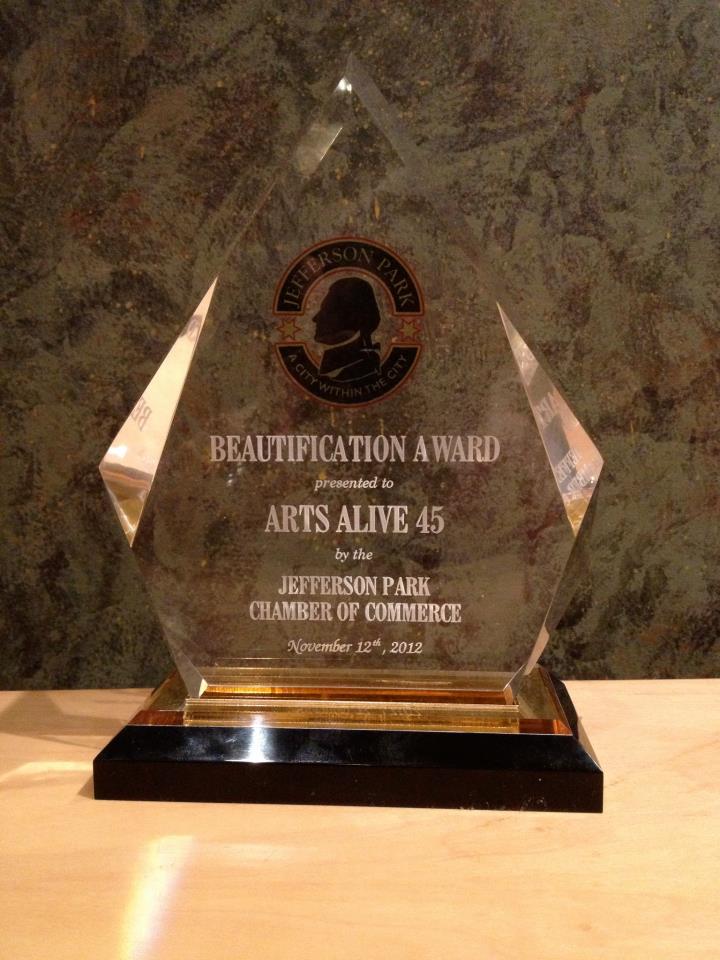 The award for the beautification award is on a table.