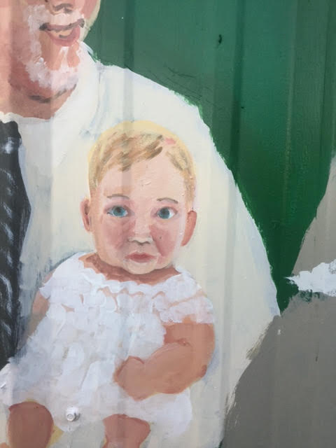 A painting of an old man and a baby.