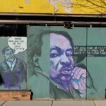 Street art with quotes and portraits.